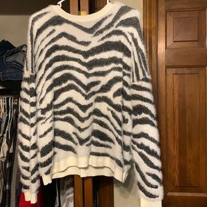 Woman’s zebra sweater